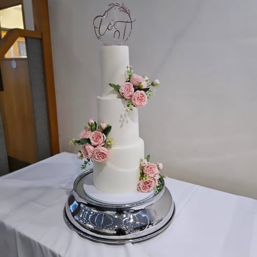 Cake and florals Bespoke wedding cake with fresh flowers